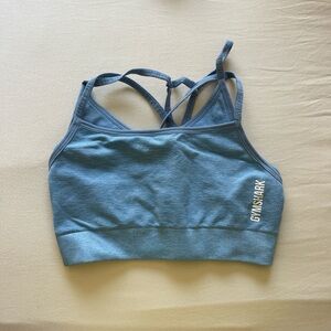 Light blue multi strap sports bra